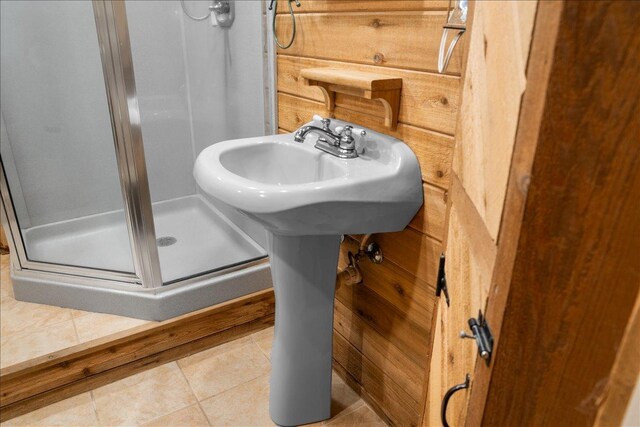 7417 N Hill Rd, Marengo, IL 60152 - full bathroom with a stall shower, tile patterned floors, and a sink