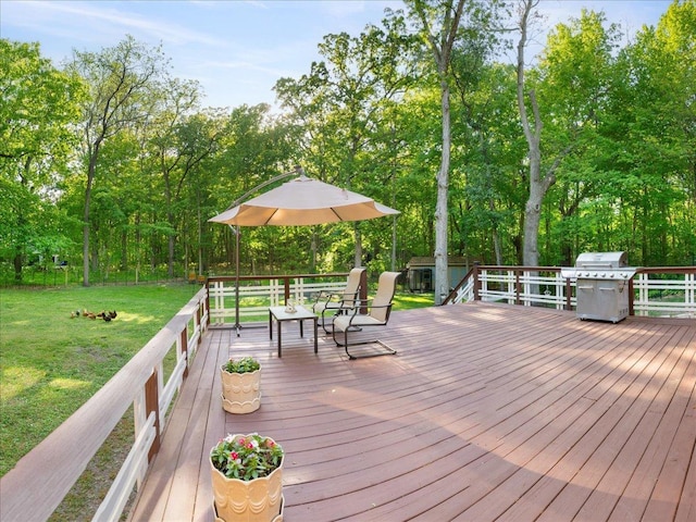 7417 N Hill Rd, Marengo, IL 60152 - deck featuring a yard, area for grilling, and view of wooded area