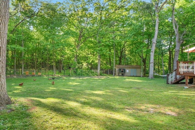7417 N Hill Rd, Marengo, IL 60152 - view of grassy yard featuring a deck and stairs