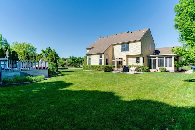 1701 Driftwood Ln, Crystal Lake, IL 60014 - view of grassy yard with a sunroom and a patio area