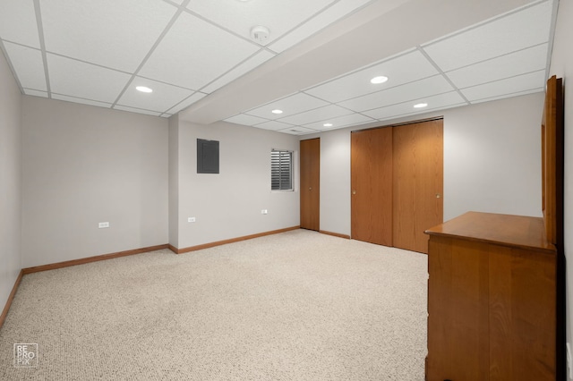 13460 S Magnolia Dr, Plainfield, IL 60544 - carpeted empty room featuring a drop ceiling, recessed lighting, a smoke detector, and electric panel