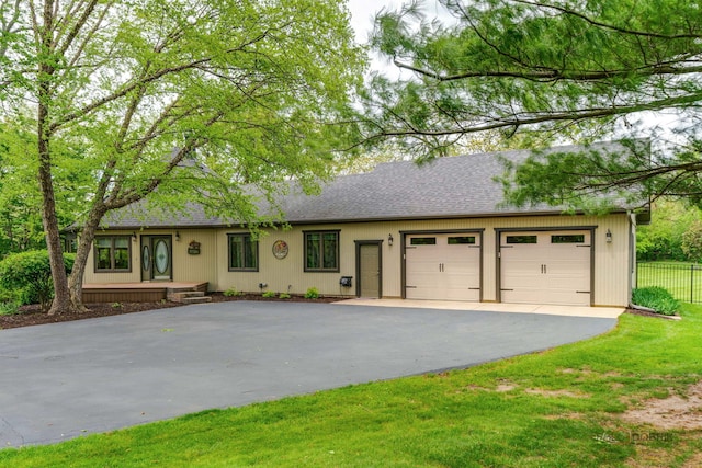 4308 Miller Oaks Dr, Mchenry, IL 60051 - view of front of property with driveway, an attached garage, and a shingled roof