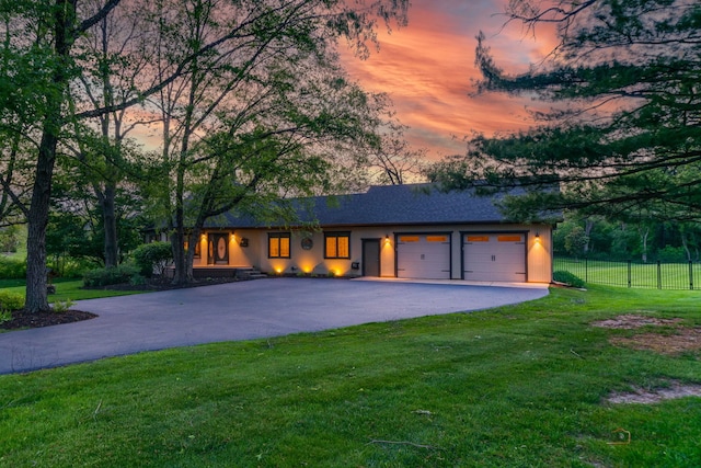 4308 Miller Oaks Dr, Mchenry, IL 60051 - view of front of property featuring driveway, an attached garage, and stucco siding