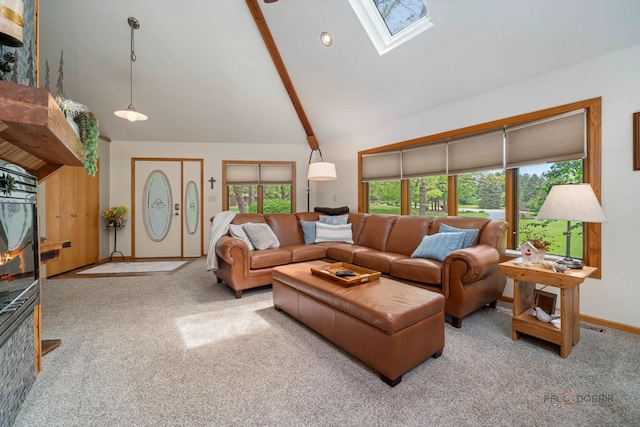 4308 Miller Oaks Dr, Mchenry, IL 60051 - carpeted living area featuring a skylight, baseboards, high vaulted ceiling, and beam ceiling