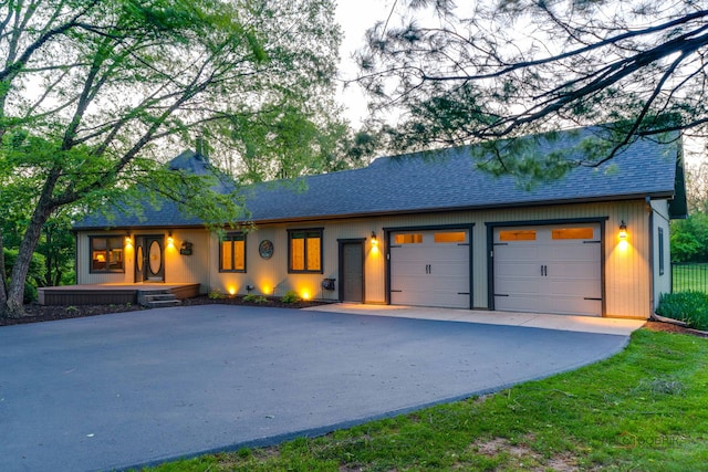 4308 Miller Oaks Dr, Mchenry, IL 60051 - view of front of home with driveway, a shingled roof, and a garage