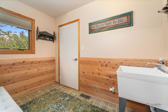 4308 Miller Oaks Dr, Mchenry, IL 60051 - bathroom with a wainscoted wall and vanity