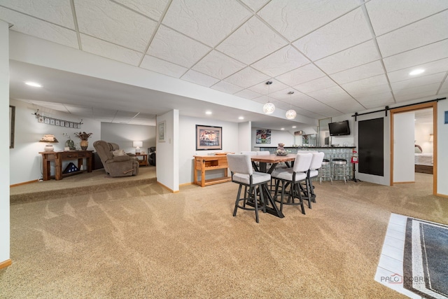 4308 Miller Oaks Dr, Mchenry, IL 60051 - dining room with a paneled ceiling, carpet, baseboards, a barn door, and recessed lighting