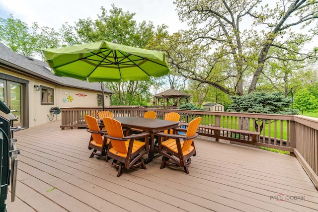 4308 Miller Oaks Dr, Mchenry, IL 60051 - wooden deck with outdoor dining area and a gazebo