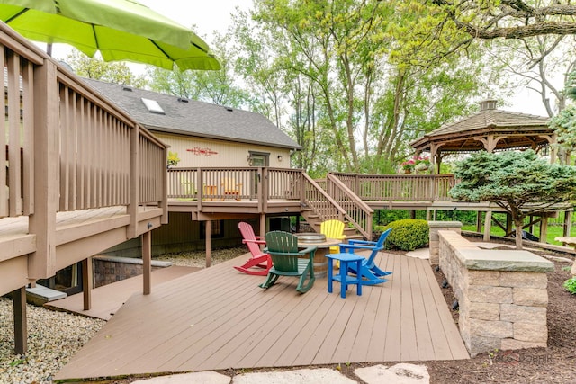 4308 Miller Oaks Dr, Mchenry, IL 60051 - wooden deck with stairs, a gazebo, and an outdoor fire pit