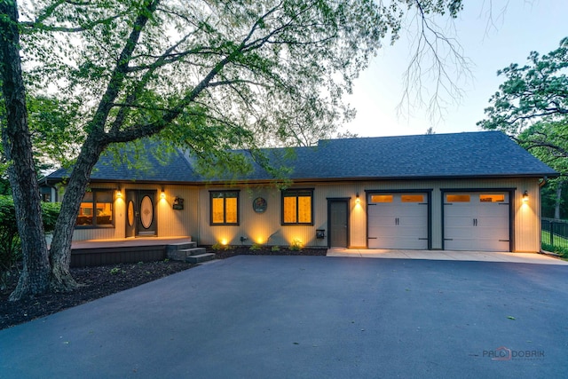 4308 Miller Oaks Dr, Mchenry, IL 60051 - view of front of home with driveway, a garage, and roof with shingles