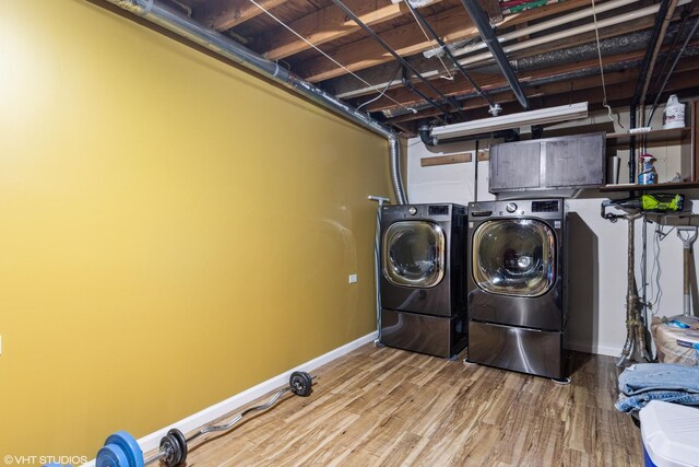 7330 Winthrop Way Unit 2, Downers Grove, IL 60515 - laundry area with independent washer and dryer, baseboards, and wood finished floors