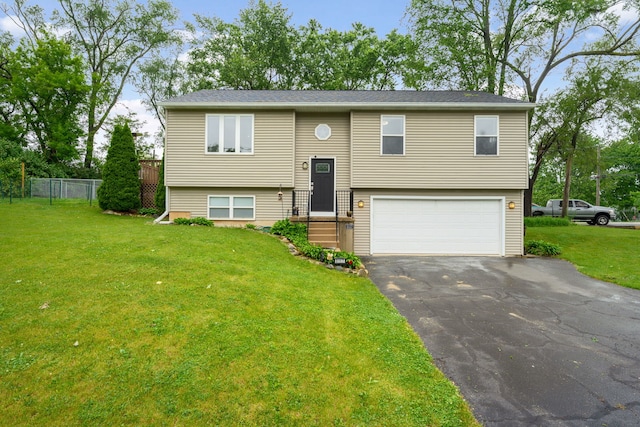 5117 Lear St, Wonder Lake, IL 60097 - bi-level home featuring a garage and driveway