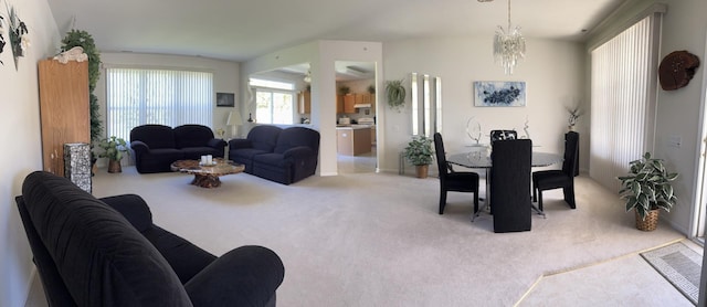 13370 Red Alder Ave, Huntley, IL 60142 - living area featuring carpet, a chandelier, and baseboards
