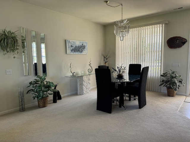 13370 Red Alder Ave, Huntley, IL 60142 - carpeted dining room with a chandelier, plenty of natural light, and baseboards