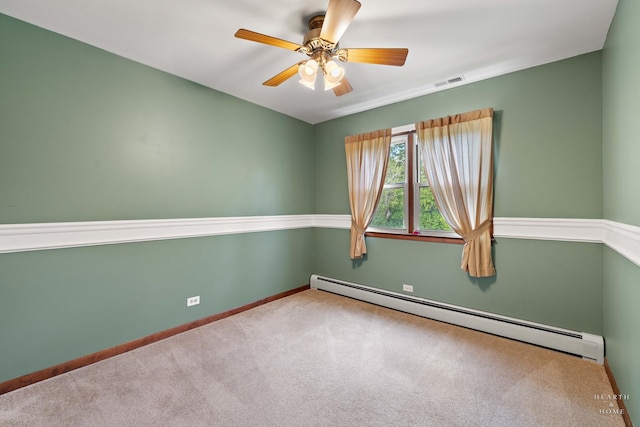 35976 N Fairfield Rd, Ingleside, IL 60041 - carpeted spare room featuring a baseboard radiator, a ceiling fan, and baseboards