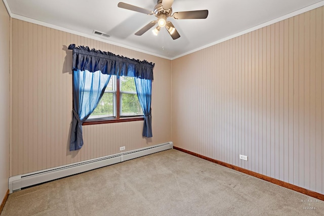 35976 N Fairfield Rd, Ingleside, IL 60041 - empty room featuring a baseboard heating unit, carpet floors, crown molding, a ceiling fan, and baseboards
