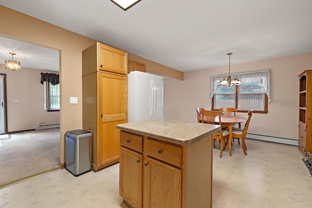 35976 N Fairfield Rd, Ingleside, IL 60041 - kitchen featuring a chandelier, freestanding refrigerator, baseboard heating, and light flooring
