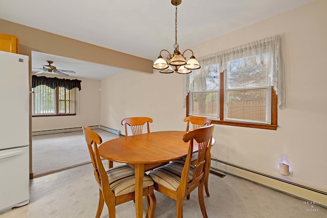 35976 N Fairfield Rd, Ingleside, IL 60041 - dining room with light colored carpet, a chandelier, baseboard heating, and a ceiling fan