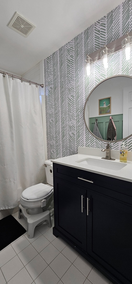 2383 Shiloh Dr, Aurora, IL 60503 - full bathroom featuring wallpapered walls, vanity, tile patterned flooring, and a shower with shower curtain
