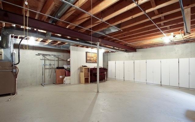 18233 Eagle Dr, Tinley Park, IL 60477 - unfinished below grade area featuring heating unit