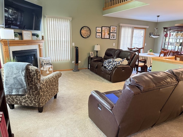 18233 Eagle Dr, Tinley Park, IL 60477 - carpeted living room featuring baseboards and a glass covered fireplace