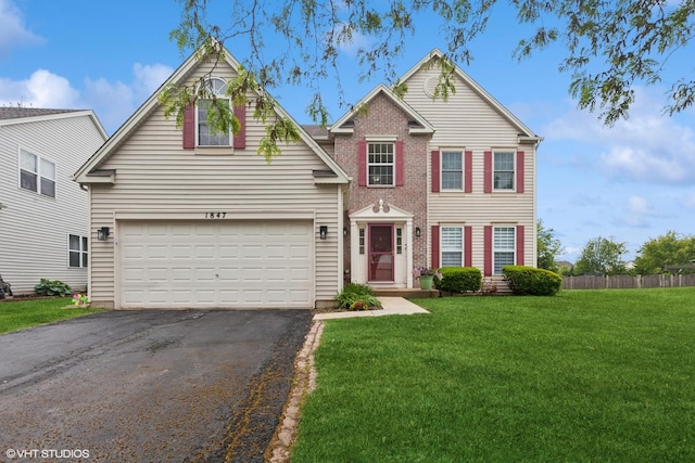 1847 Lake Shore Dr, Romeoville, IL 60446 - traditional home with driveway and a garage