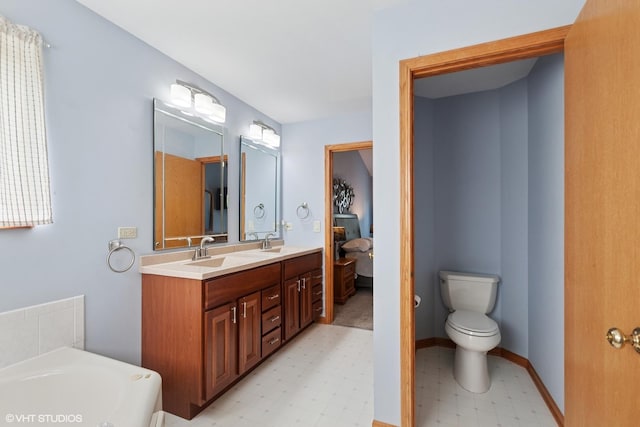 1847 Lake Shore Dr, Romeoville, IL 60446 - full bath with double vanity, a bath, tile patterned floors, and toilet