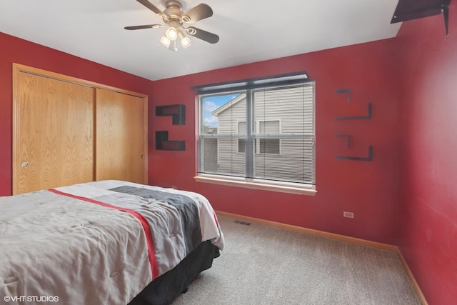 1847 Lake Shore Dr, Romeoville, IL 60446 - carpeted bedroom featuring baseboards, a closet, and a ceiling fan