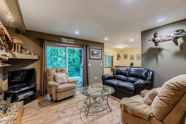21 Carribean Dr, Putnam, IL 61560 - living room with light wood finished floors and recessed lighting