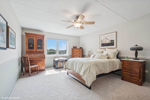 6807 N Milwaukee Ave Unit 204, Niles, IL 60714 - bedroom featuring light carpet and a ceiling fan