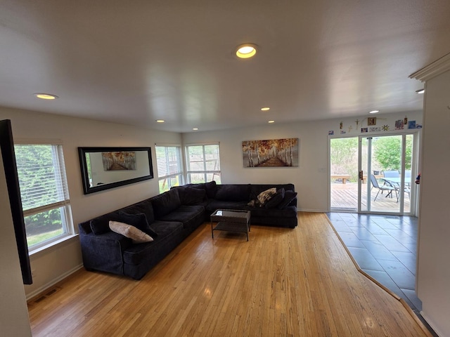 7943 Dada Dr, Gurnee, IL 60031 - living room with light wood-type flooring, recessed lighting, and baseboards