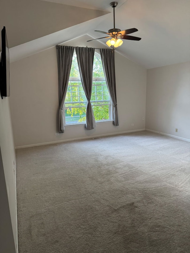 7943 Dada Dr, Gurnee, IL 60031 - carpeted empty room with ceiling fan, baseboards, and vaulted ceiling