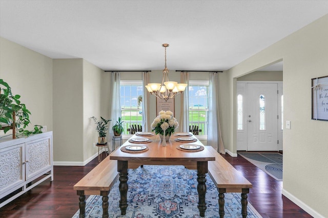 1228 N County Road 530 Rd E, Tuscola, IL 61953 - dining space featuring a chandelier and dark wood finished floors