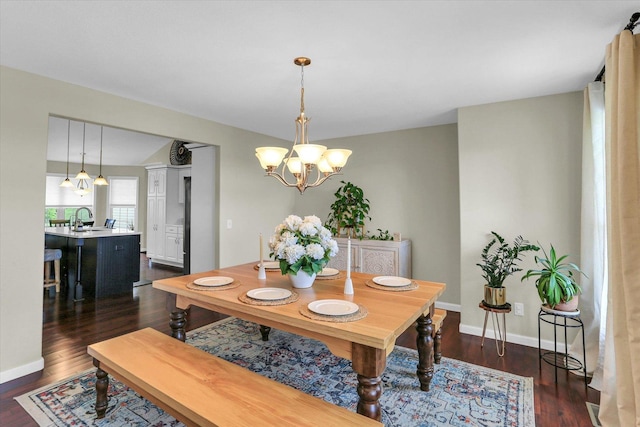 1228 N County Road 530 Rd E, Tuscola, IL 61953 - dining area with a chandelier and dark wood-type flooring