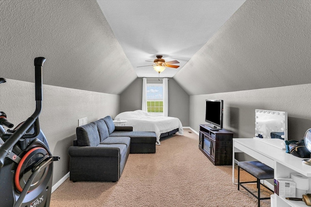 1228 N County Road 530 Rd E, Tuscola, IL 61953 - bedroom with light carpet, a textured ceiling, lofted ceiling, a textured wall, and a ceiling fan
