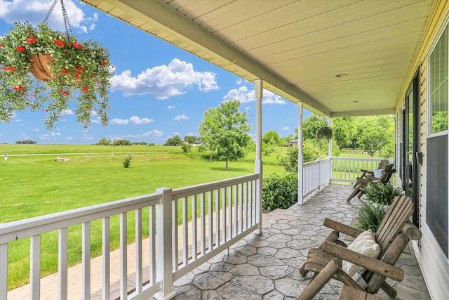 1228 N County Road 530 Rd E, Tuscola, IL 61953 - porch featuring a view of countryside