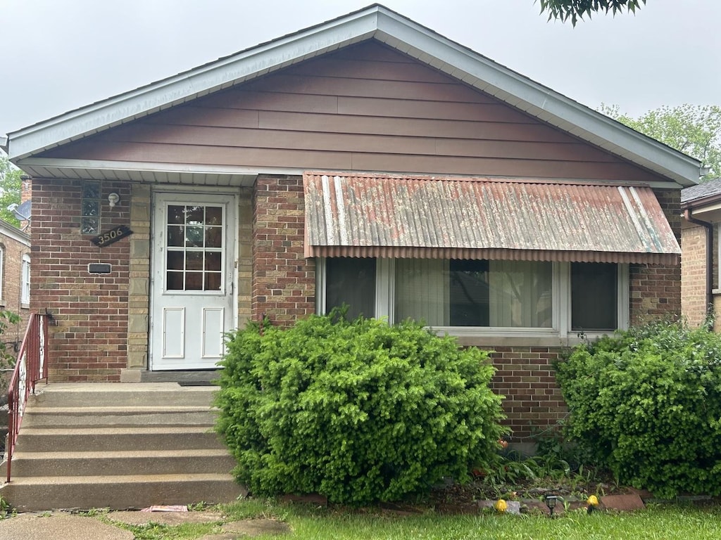 3506 W 78th St, Chicago, IL 60652 - view of front of home featuring brick siding
