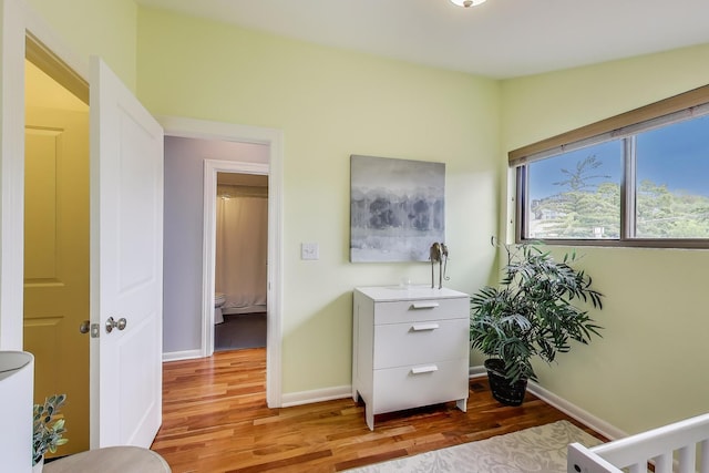 847 N Damen Ave Unit 2R, Chicago, IL 60622 - bedroom featuring light wood-style floors and baseboards