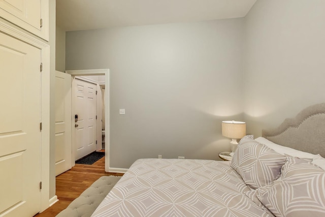 847 N Damen Ave Unit 2R, Chicago, IL 60622 - bedroom featuring wood finished floors and baseboards