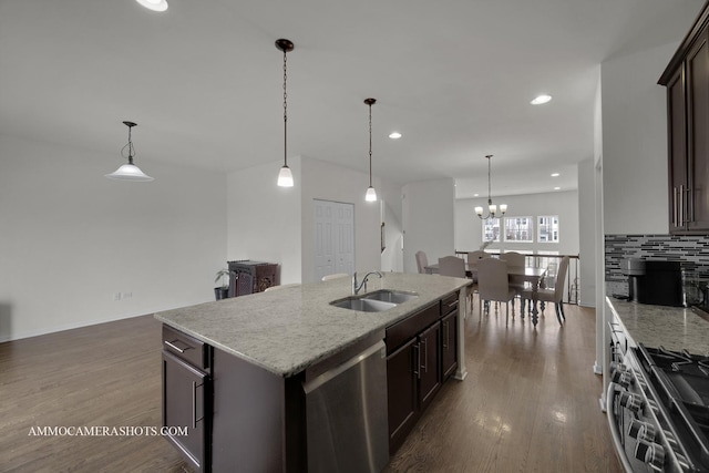 863 Lewisburg Ln, Aurora, IL 60504 - kitchen featuring appliances with stainless steel finishes, a sink, decorative backsplash, dark wood-style flooring, and recessed lighting