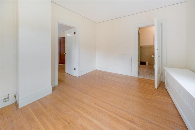 408 W Iowa St, Urbana, IL 61801 - unfurnished room featuring light wood finished floors