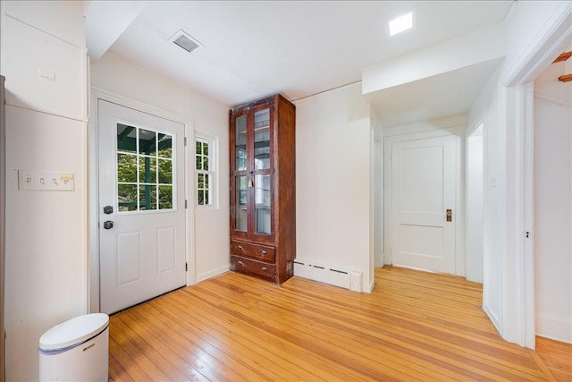 408 W Iowa St, Urbana, IL 61801 - foyer featuring a baseboard heating unit and light wood-type flooring