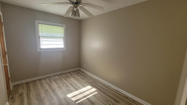 107 Georgine St, Crystal Lake, IL 60014 - unfurnished room featuring light wood-style flooring, baseboards, and a ceiling fan