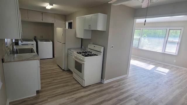 107 Georgine St, Crystal Lake, IL 60014 - kitchen with white appliances, light wood-style floors, a ceiling fan, light countertops, and baseboards