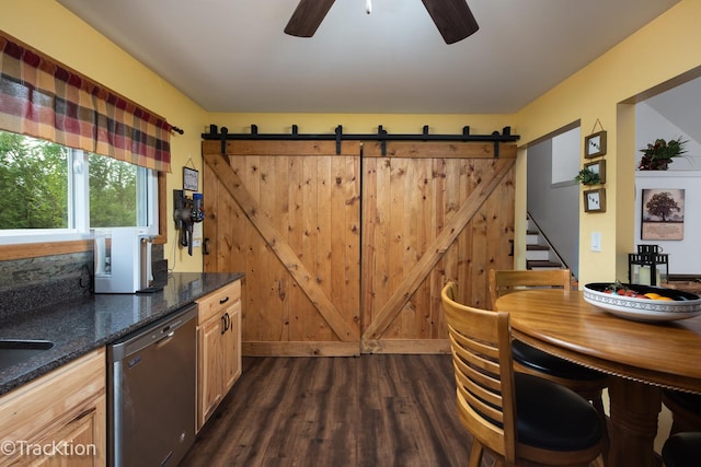 543 White Birch Rd, Lindenhurst, IL 60046 - dining space featuring dark wood-style flooring, a ceiling fan, a barn door, and stairway