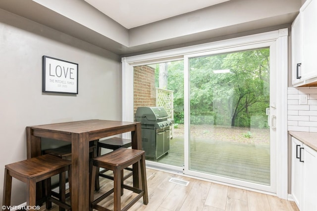 30W012 Laurel Ct, Warrenville, IL 60555 - dining area with light wood-type flooring