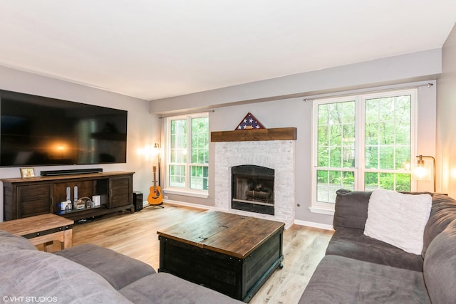 30W012 Laurel Ct, Warrenville, IL 60555 - living room featuring wood finished floors, a fireplace, and baseboards