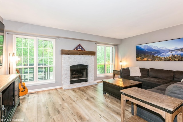 30W012 Laurel Ct, Warrenville, IL 60555 - living area with light wood-style flooring, a fireplace, and baseboards