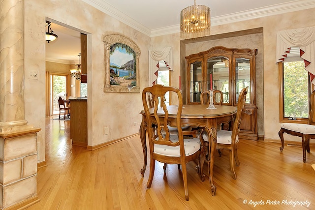8720 Galleria Ct, Spring Grove, IL 60081 - dining room featuring a chandelier, light wood-style floors, baseboards, and ornamental molding