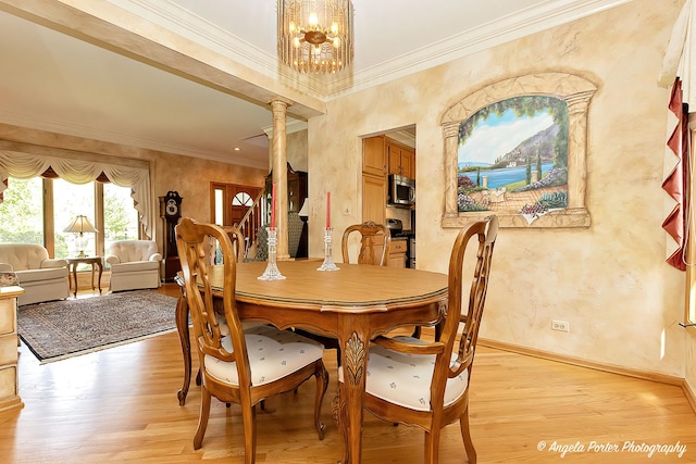 8720 Galleria Ct, Spring Grove, IL 60081 - dining space with ornate columns, light wood finished floors, crown molding, a textured wall, and baseboards